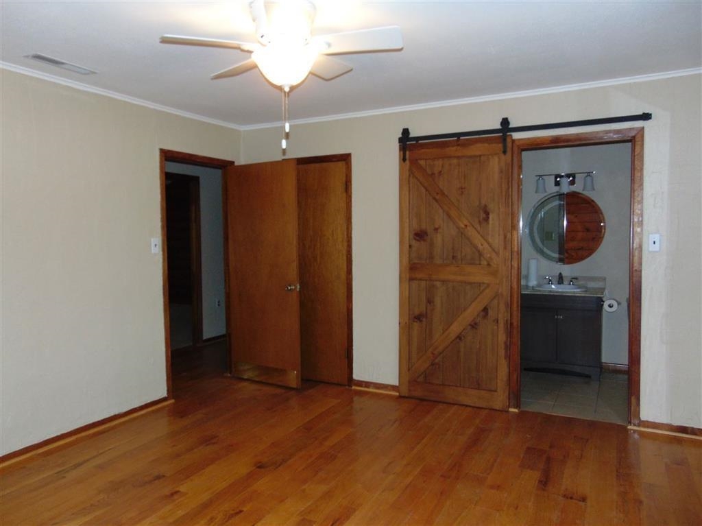 504 North Chaparral Burnet, TX 78611 - Photo 7 of 10 wooden floor in an empty room