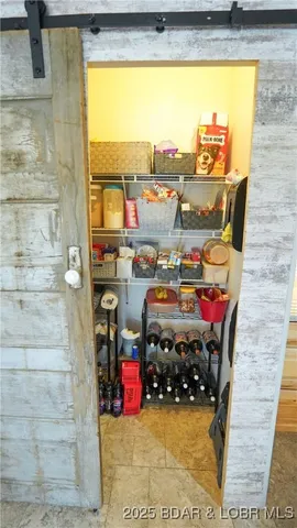 $575,000 | 99 Rustic Woods Road, Sunrise Beach, MO 65079