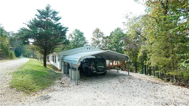 $575,000 | 99 Rustic Woods Road, Sunrise Beach, MO 65079