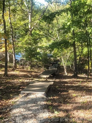 $575,000 | 99 Rustic Woods Road, Sunrise Beach, MO 65079