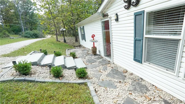 $575,000 | 99 Rustic Woods Road, Sunrise Beach, MO 65079