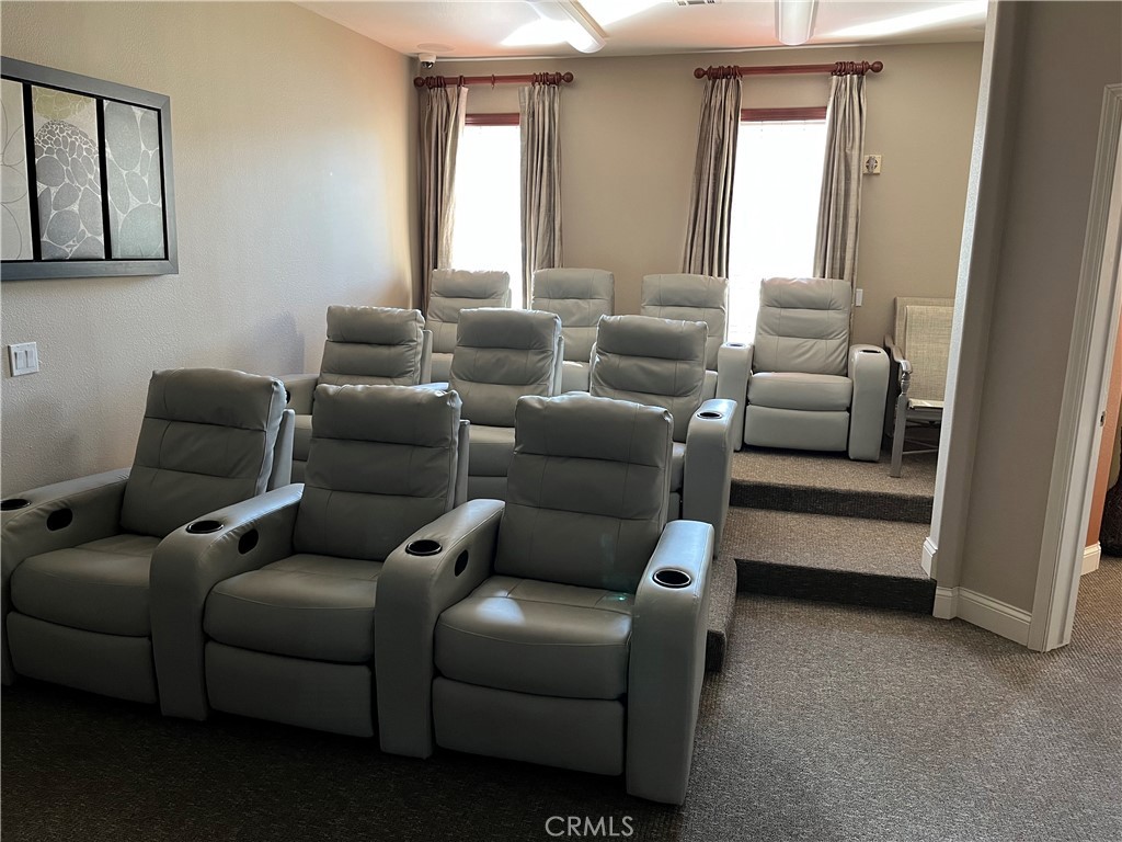 375 Central, Unit 19 Riverside, CA 92507 - Photo 7 of 9 Sonata Clubhouse Theatre Room