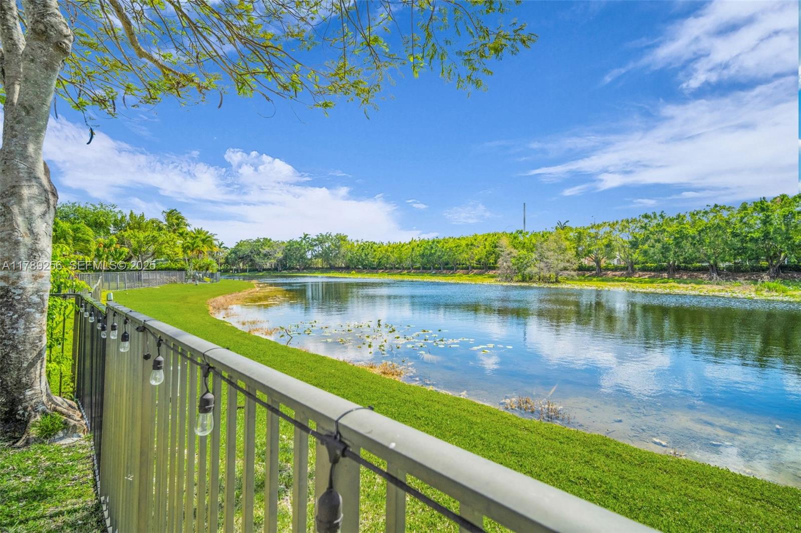 3739 Oak Ridge Circle Weston, FL 33331 - Photo 19 of 71 a view of a lake with a outdoor space