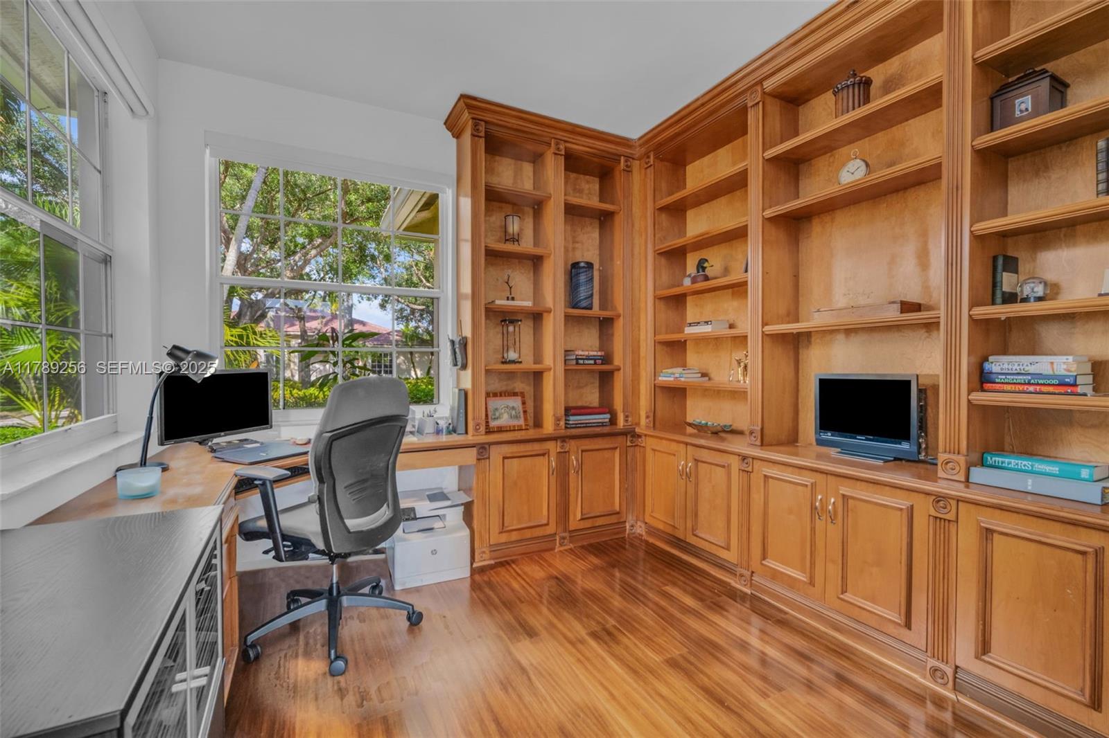 3739 Oak Ridge Circle Weston, FL 33331 - Photo 31 of 71 a view of a workspace with furniture and a window
