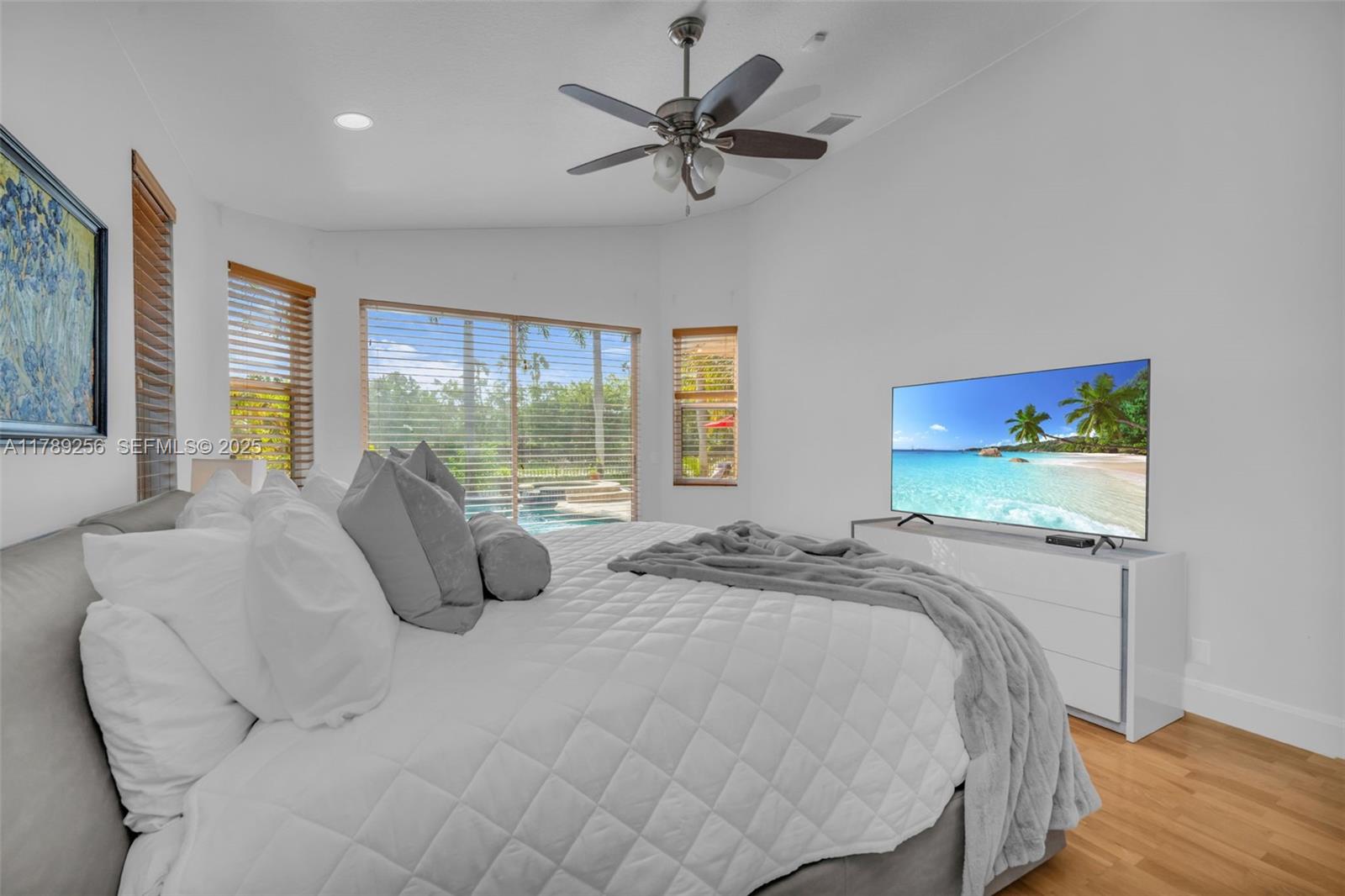 3739 Oak Ridge Circle Weston, FL 33331 - Photo 35 of 71 a bedroom with a bed and window