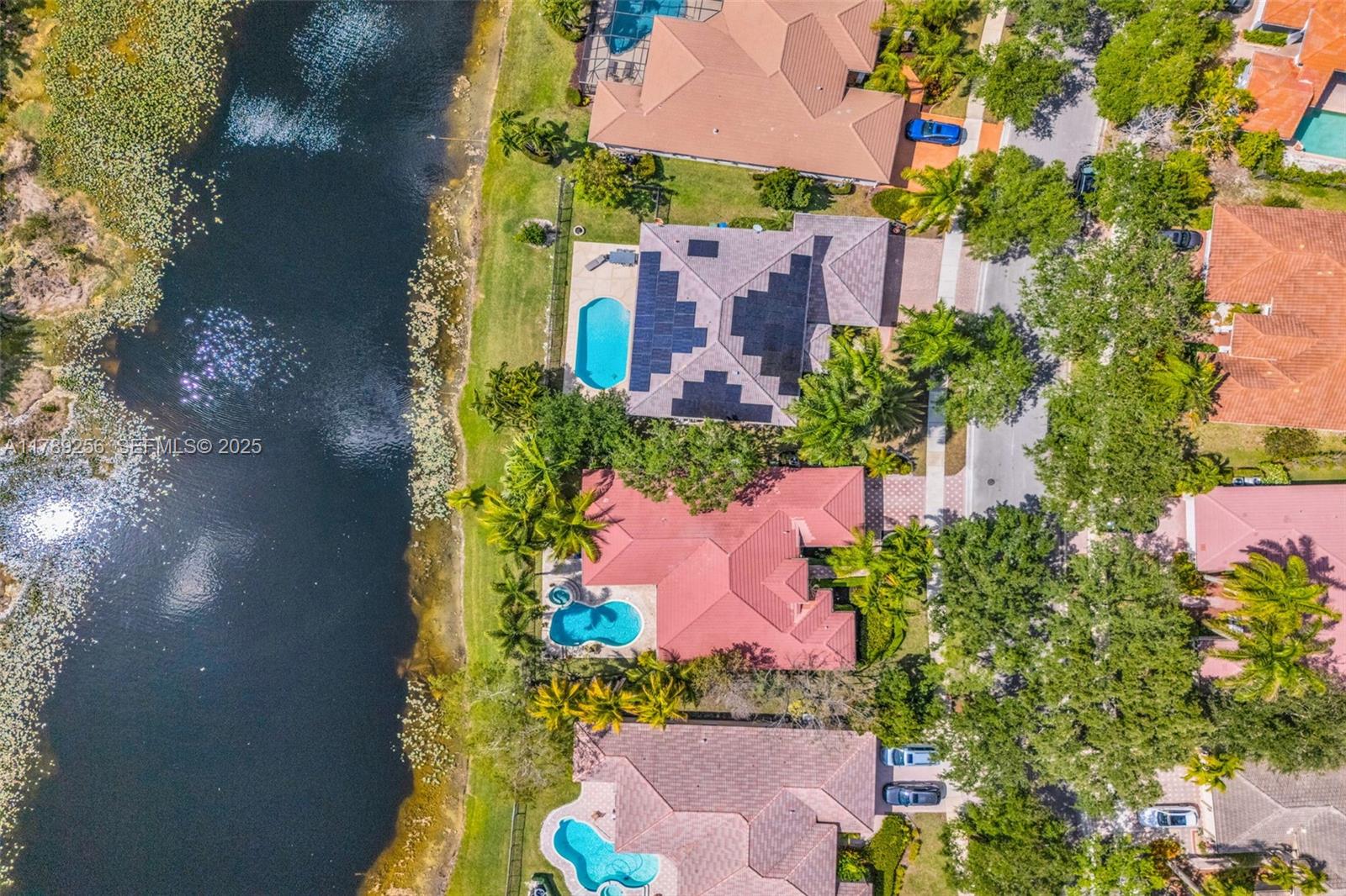 3739 Oak Ridge Circle Weston, FL 33331 - Photo 69 of 71 an aerial view of a house with a yard