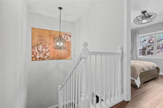 a view of a hallway with a bedroom