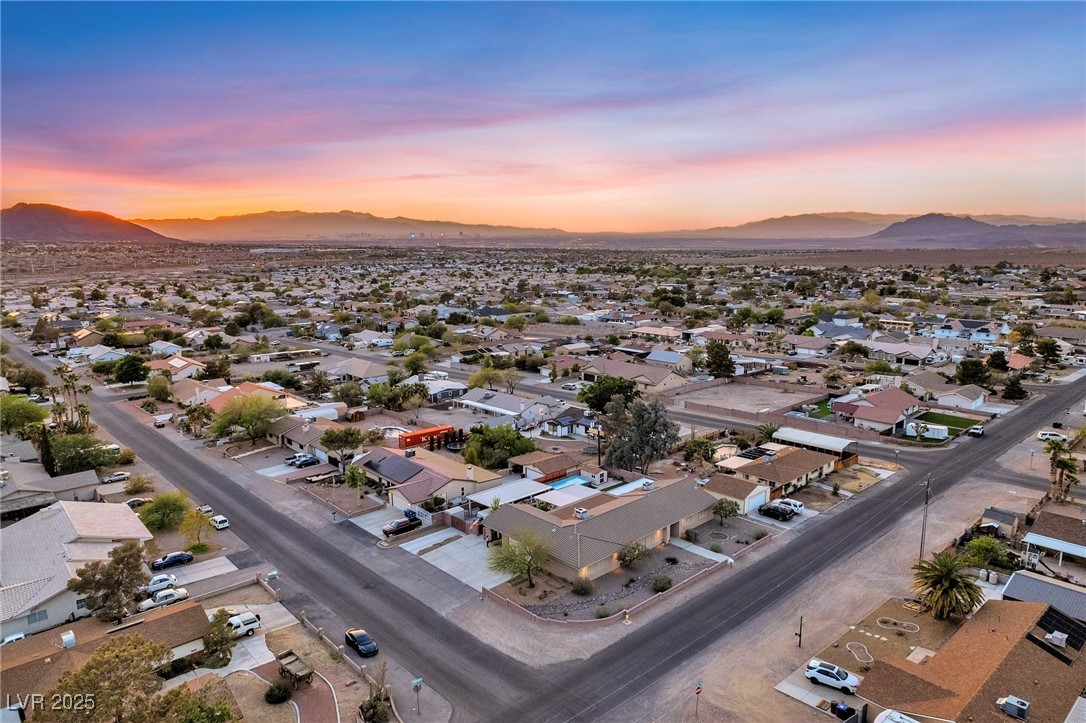 2251 Thoroughbred Road Henderson, NV 89002 - Photo 58 of 60 Aerial view at dusk featuring a mountain view and a residential view
