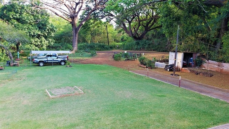 4940 Awawa Road Hanapepe, HI 96705 - Photo 19 of 22 a view of a backyard with sitting area