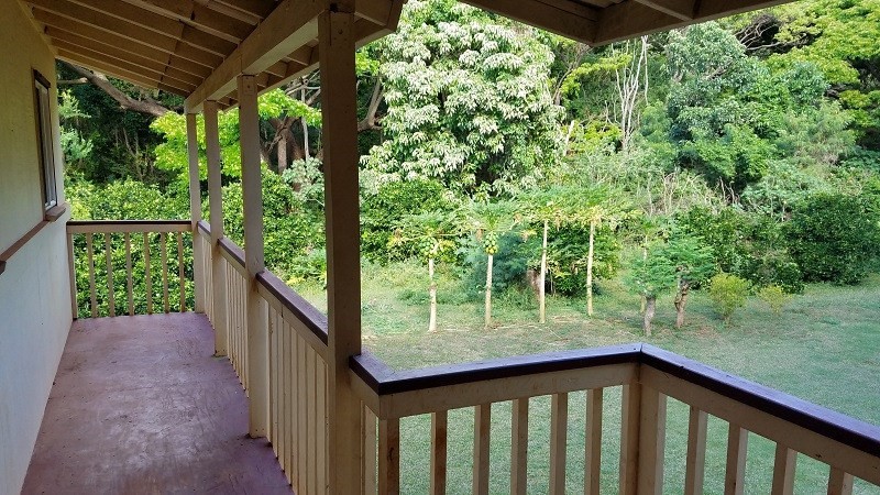 4940 Awawa Road Hanapepe, HI 96705 - Photo 4 of 22 a view of a wooden deck with a yard