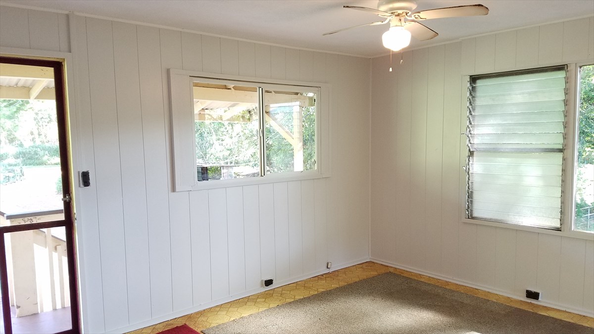 4940 Awawa Road Hanapepe, HI 96705 - Photo 8 of 22 an empty room with a window