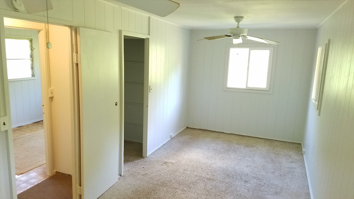 4940 Awawa Road Hanapepe, HI 96705 - Photo 10 of 22 a view of an empty room with a window