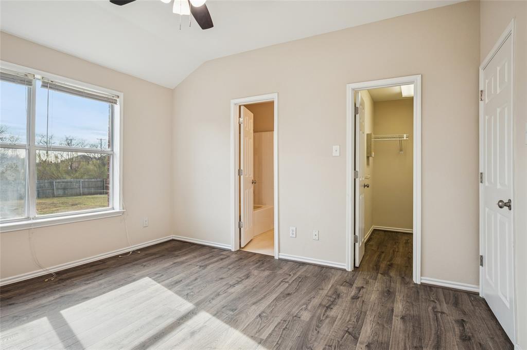 407 Autry Boulevard Gunter, TX 75058 - Photo 16 of 28 wooden floor in an empty room with a window