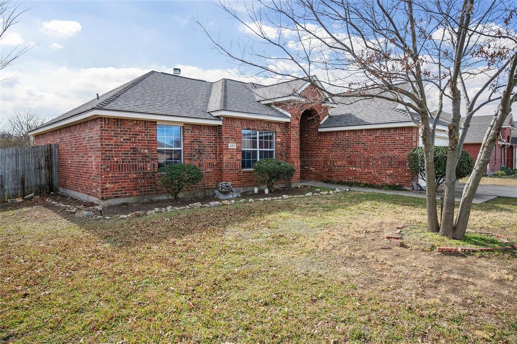 407 Autry Boulevard Gunter, TX 75058 - Photo 2 of 28 a view of a house with a yard