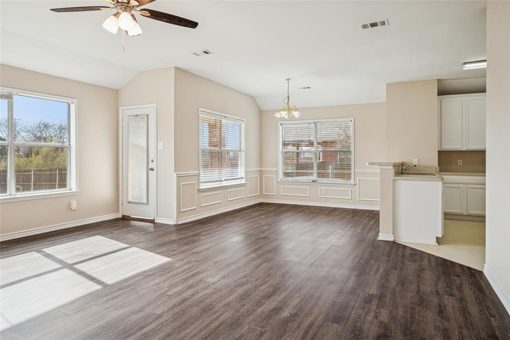 407 Autry Boulevard Gunter, TX 75058 - Photo 8 of 28 a view of livingroom with hardwood floor and a ceiling fan