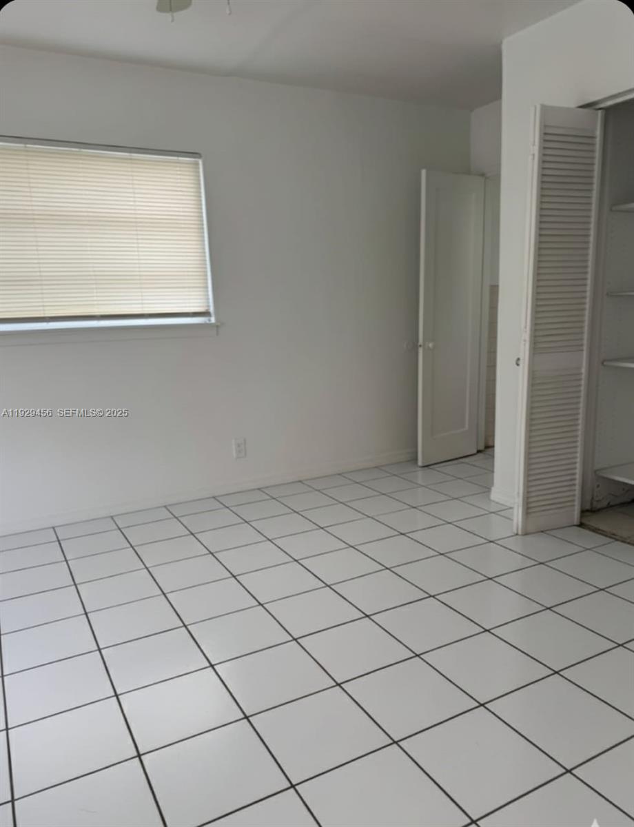 1820 Funston Street, Unit A Hollywood, FL 33020 - Photo 3 of 6 a view of room and window