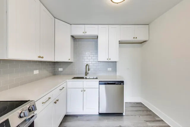 a bathroom with a double vanity sink and mirror