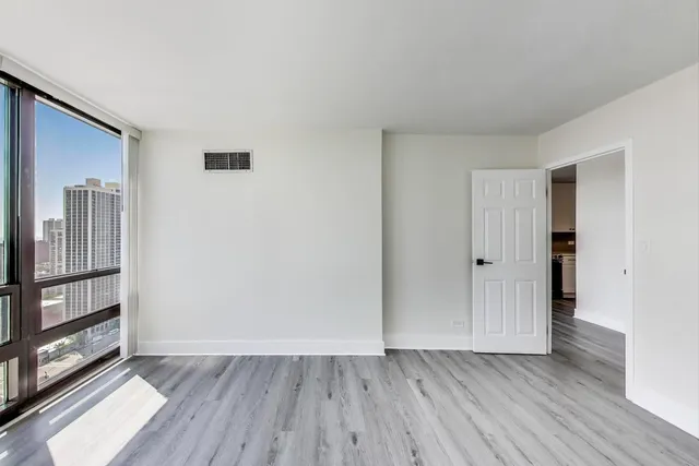 a large white building with kitchen view