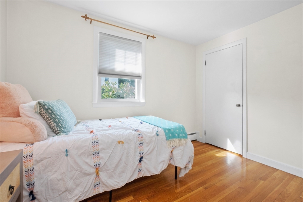 2 Lodge Road Natick, MA 01760 - Photo 16 of 36 a bedroom with a bed and a window