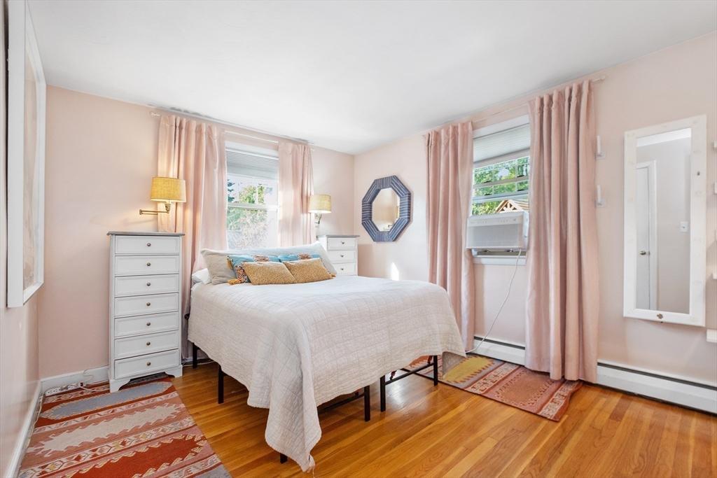 2 Lodge Road Natick, MA 01760 - Photo 17 of 36 a bedroom with a bed and a dresser