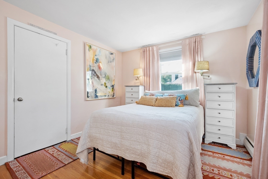 2 Lodge Road Natick, MA 01760 - Photo 18 of 36 a bedroom with a bed and a window