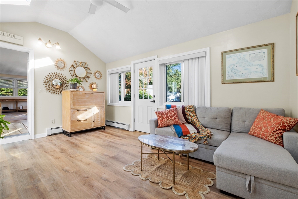 2 Lodge Road Natick, MA 01760 - Photo 6 of 36 a living room with furniture and a large window