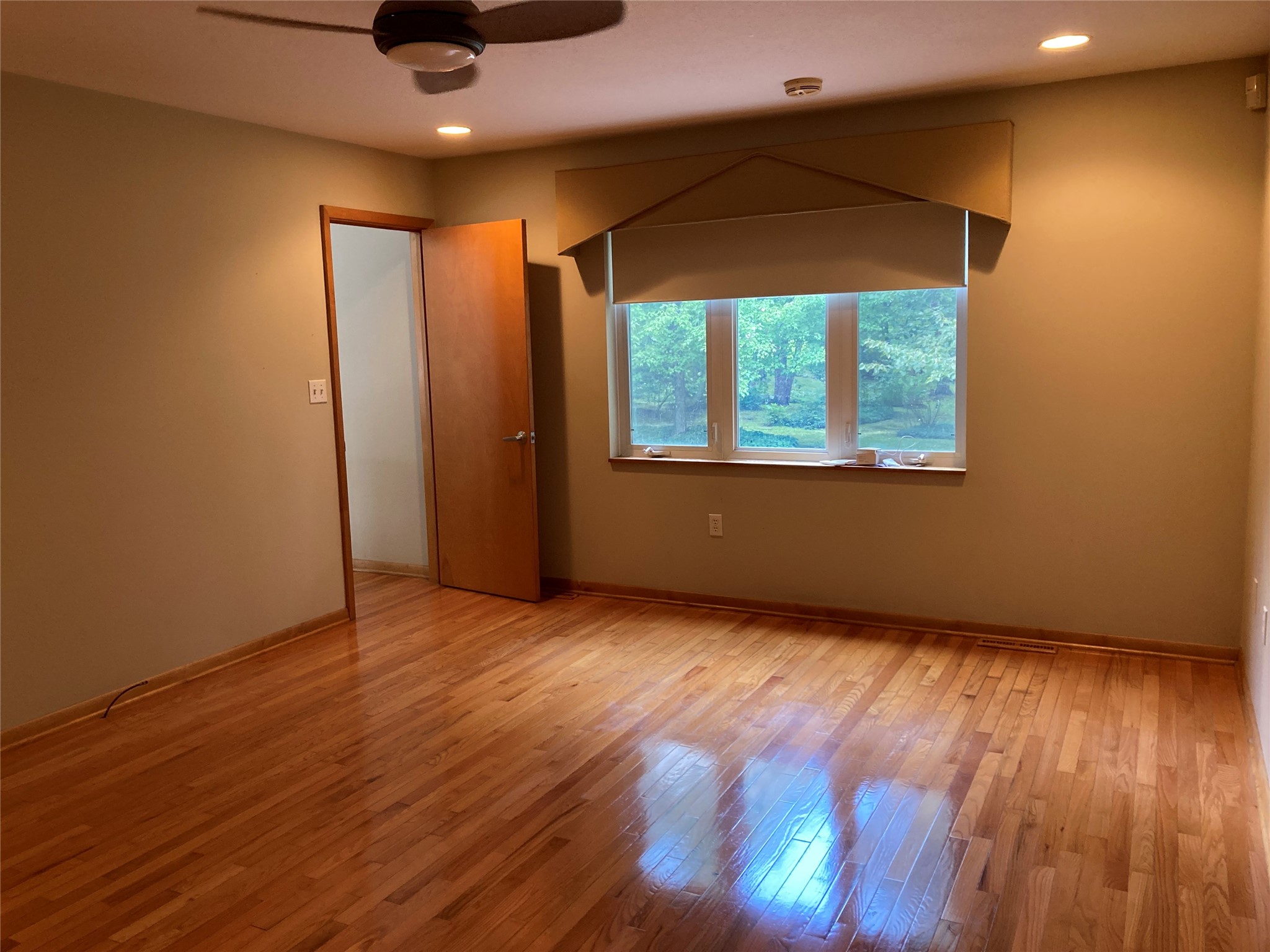301 Stuart Way Erie, PA 16509 - Photo 20 of 50 Primary suite bedroom with views of the tranquil backyard