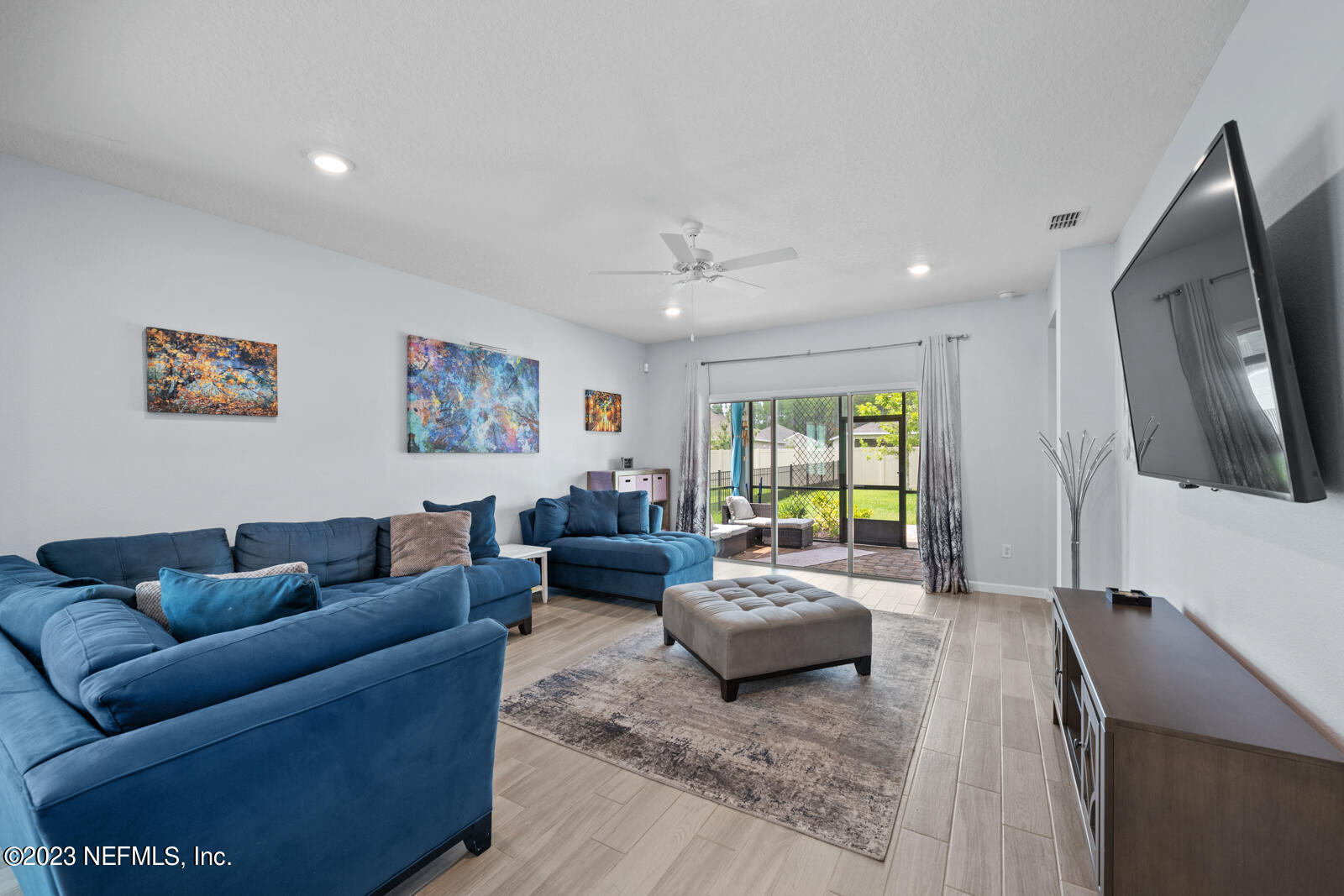 31 Seamount Way St. Augustine, FL 32092 - Photo 19 of 72 a living room with furniture and a flat screen tv