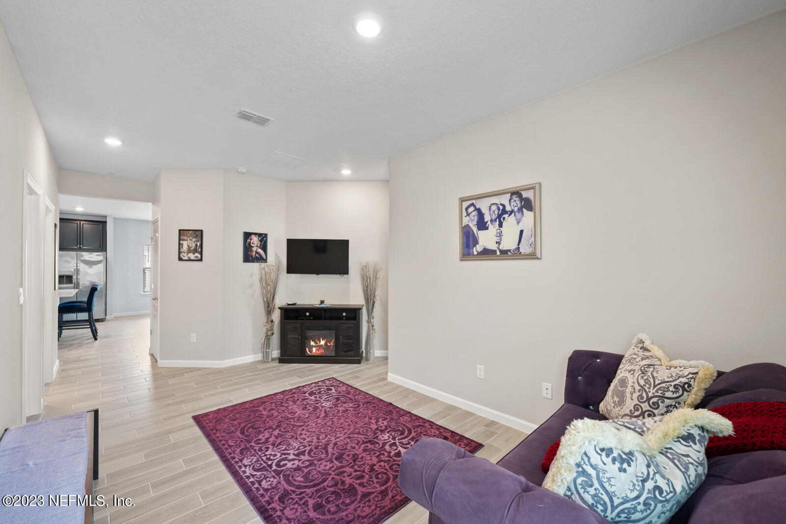 31 Seamount Way St. Augustine, FL 32092 - Photo 26 of 72 a living room with furniture and a fireplace