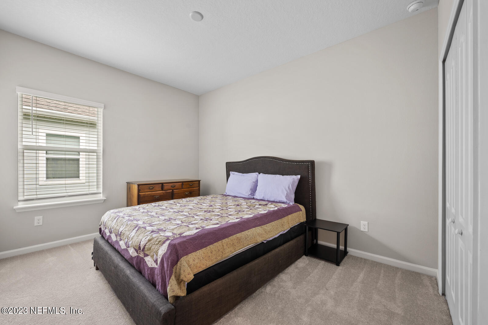 31 Seamount Way St. Augustine, FL 32092 - Photo 27 of 72 a bedroom with a bed and a window