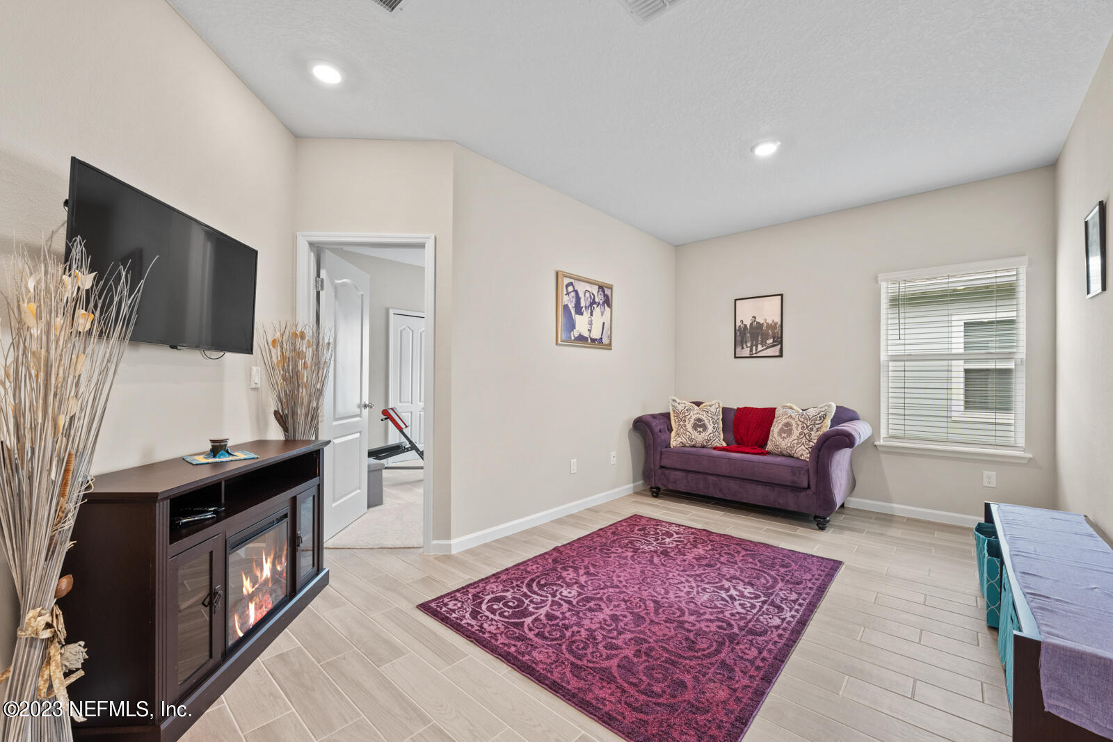 31 Seamount Way St. Augustine, FL 32092 - Photo 29 of 72 a living room with furniture and a flat screen tv
