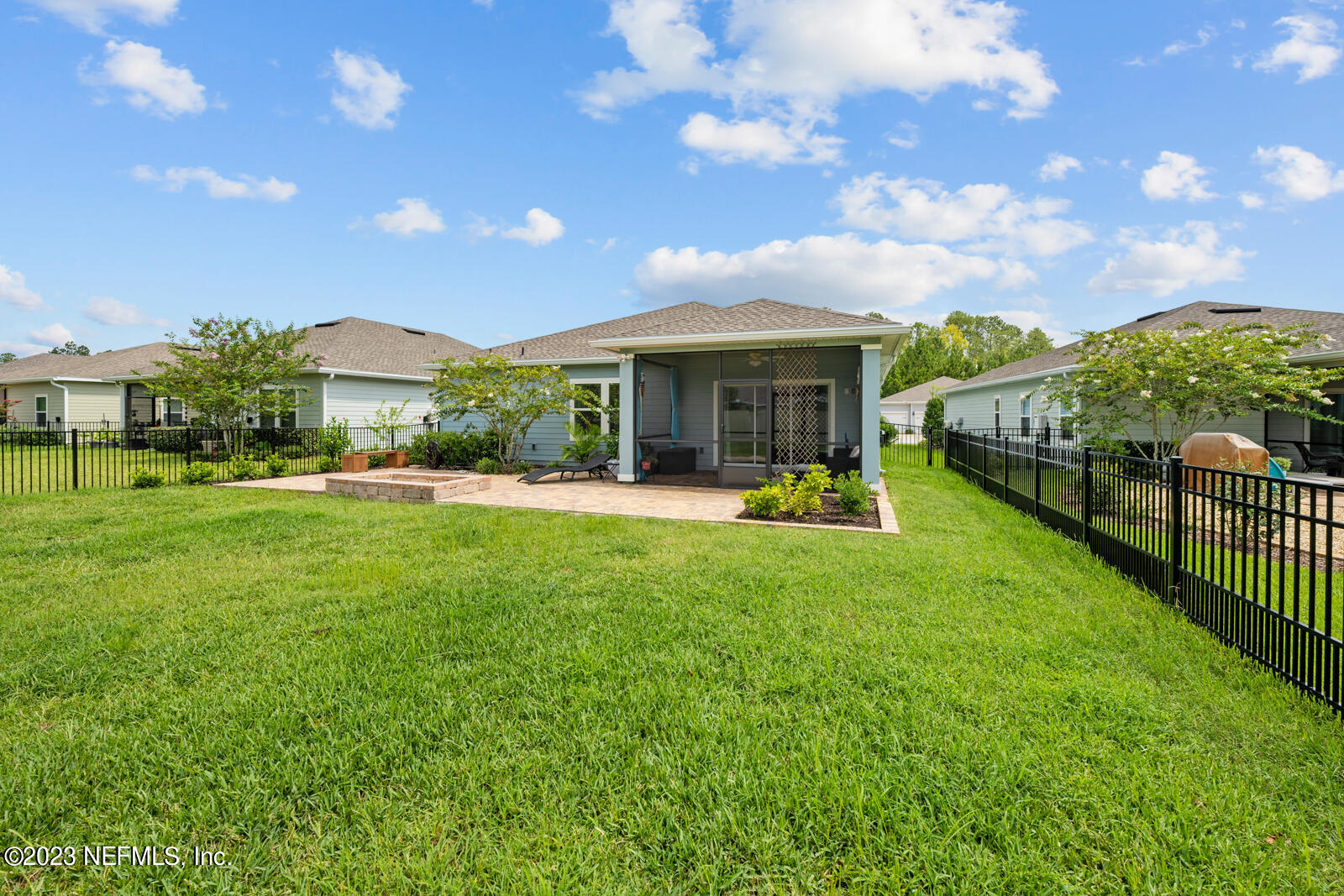 31 Seamount Way St. Augustine, FL 32092 - Photo 35 of 72 a view of a house with a big yard and potted plants