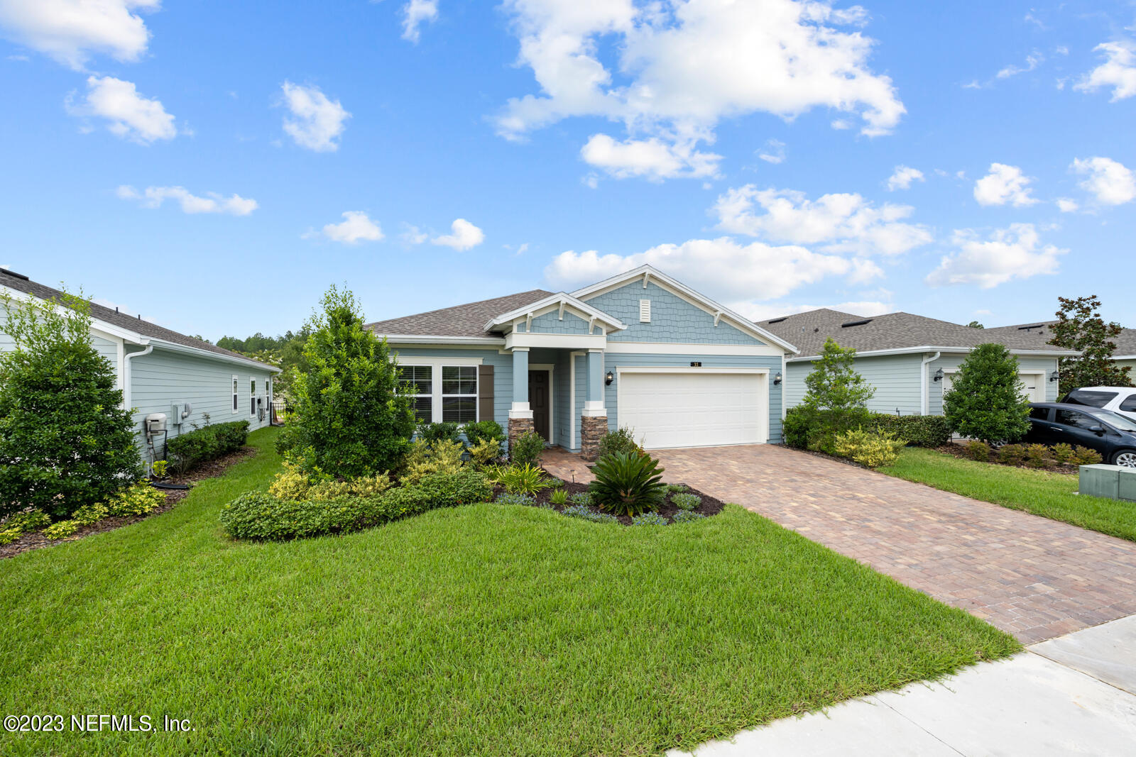 31 Seamount Way St. Augustine, FL 32092 - Photo 39 of 72 a front view of a house with a yard and garage