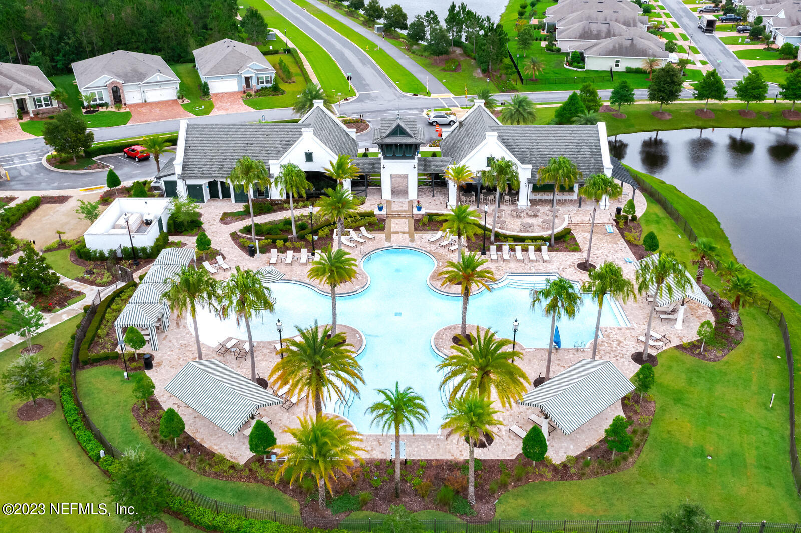 31 Seamount Way St. Augustine, FL 32092 - Photo 48 of 72 an aerial view of residential houses with swimming pool and lawn chairs