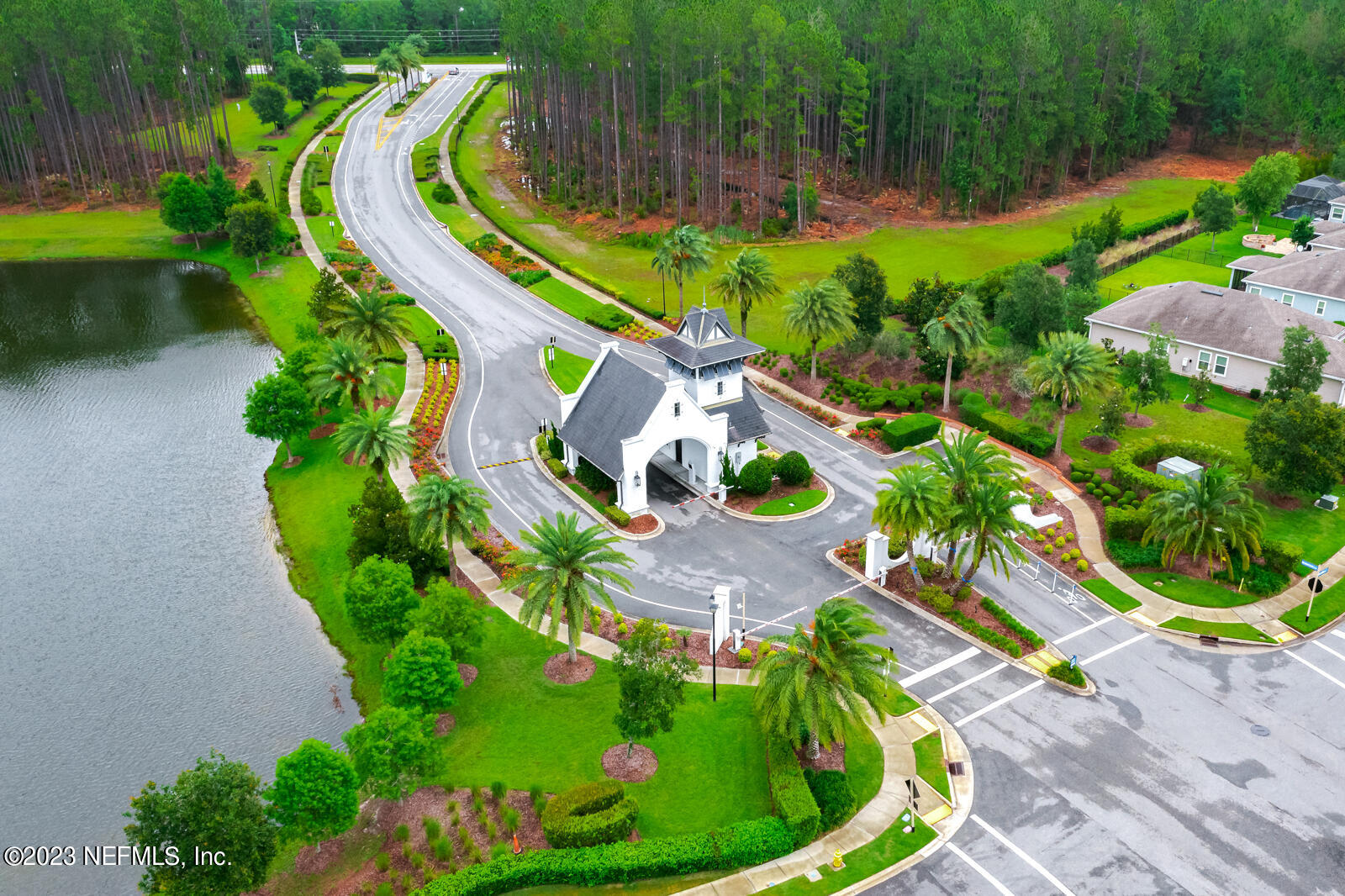 31 Seamount Way St. Augustine, FL 32092 - Photo 72 of 72 an aerial view of a house with a garden and swimming pool