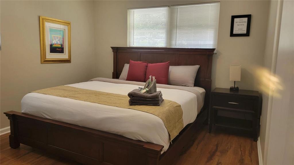 3000 Creel Road Atlanta, GA 30349 - Photo 35 of 52 a bedroom with a bed and a window