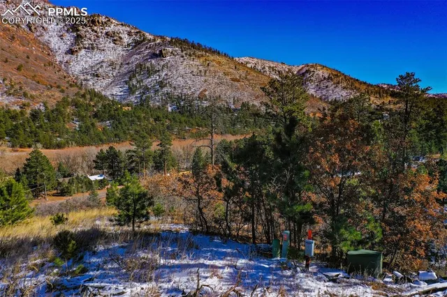 a view of a building with a mountain ground