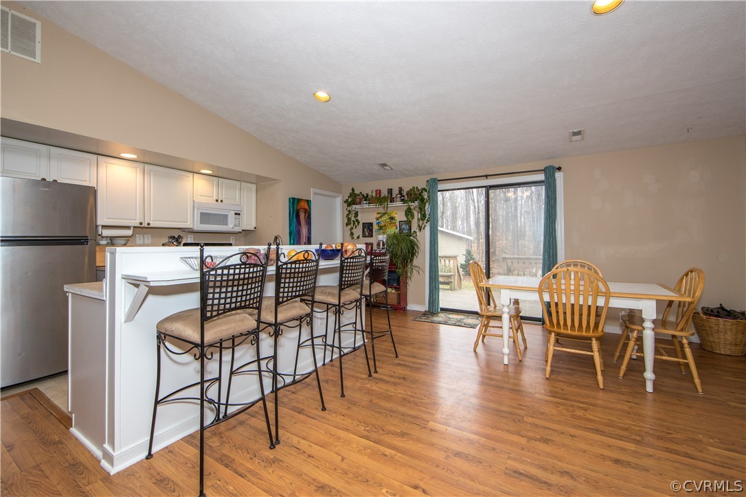 1896 Cook Road Powhatan, VA 23139 - Photo 8 of 31 Kitchen, Dining Area and Sliding Glass Door to Bac