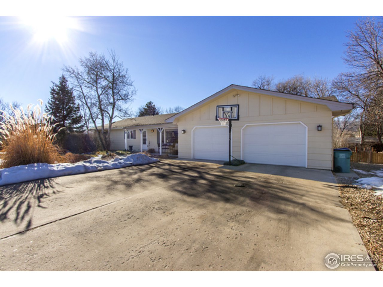 1105 Lin Mar Drive Fort Collins, CO 80521 - Photo 1 of 29 a view of a house with a yard