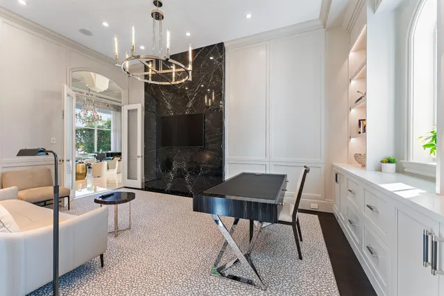 a bathroom with a double vanity sink toilet mirror and shower