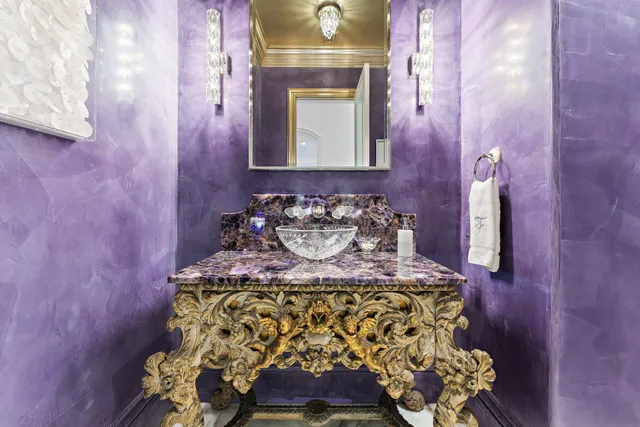 a bathroom with a double vanity sink mirror and shower
