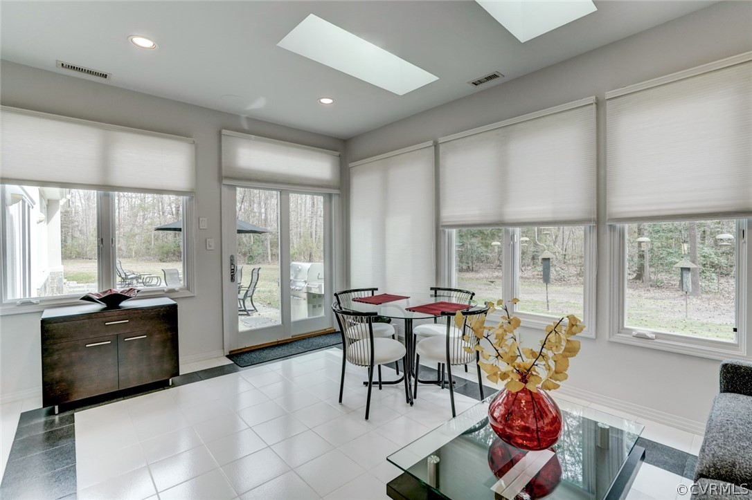 524 Edgar Road Hanover, VA 23069 - Photo 12 of 28 Bright sun room with entrance to the patio.