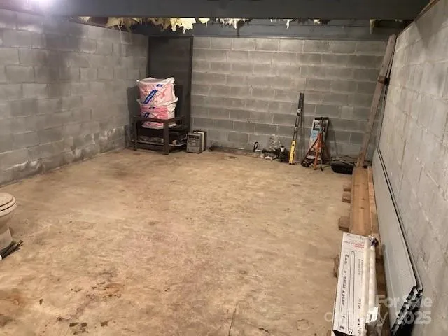 a view of a room with a large window