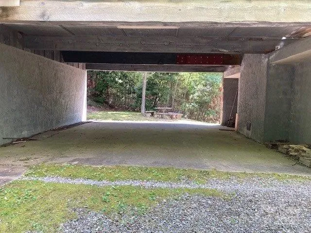 a view of balcony with wooden floor