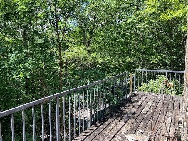 860 Pless Underwood Road Maggie Valley, NC 28751 - Photo 19 of 45 a view of balcony with wooden floor