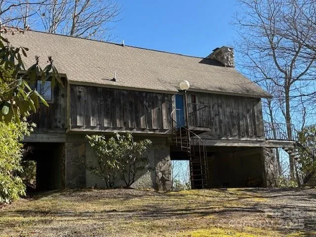 a view of a yard with some trees