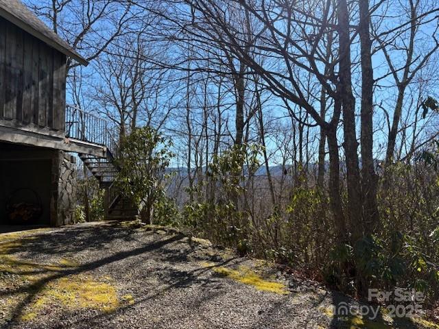 860 Pless Underwood Road Maggie Valley, NC 28751 - Photo 23 of 45 a backyard of a house with lots of green space