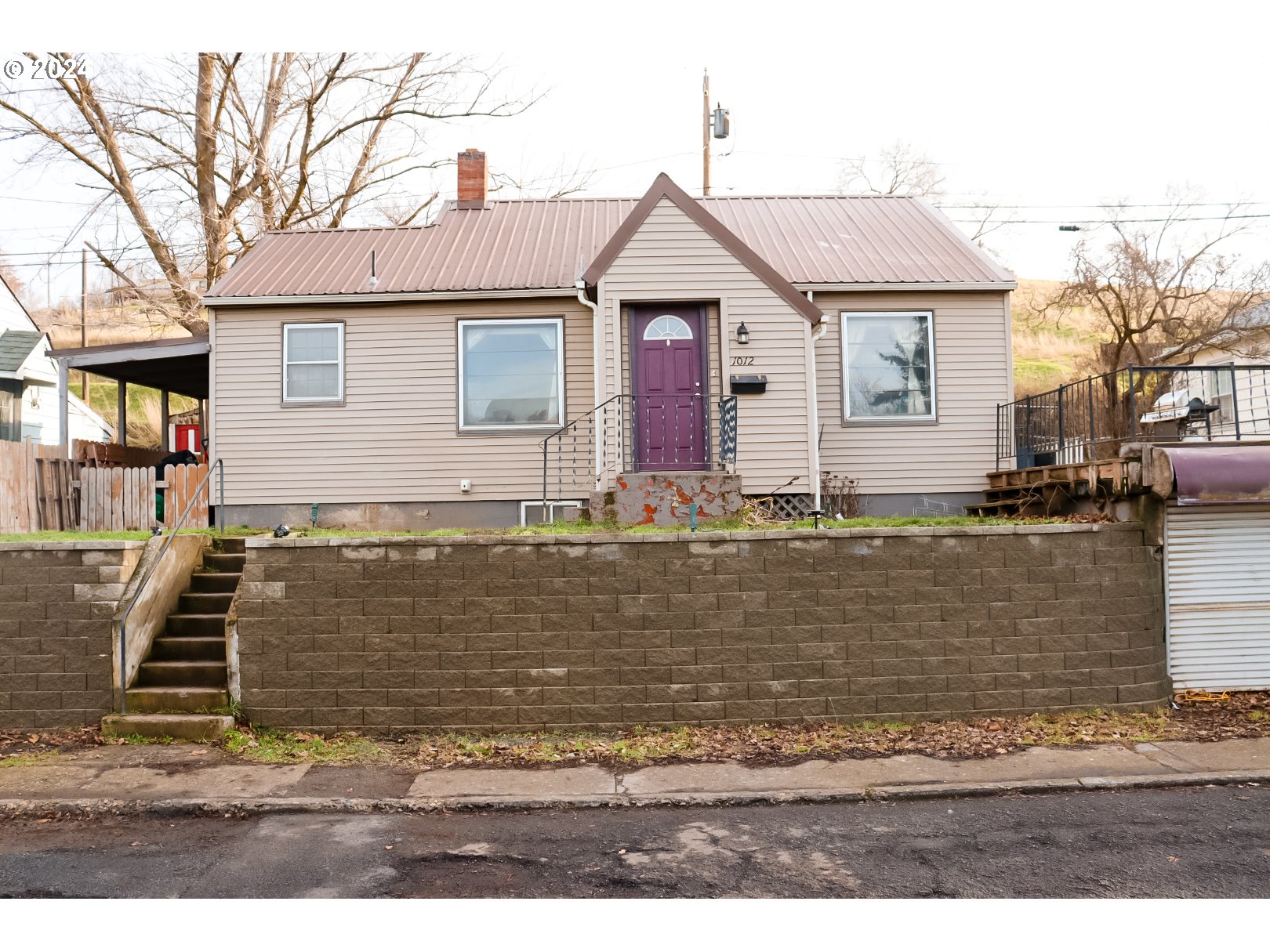 1012 Southwest Goodwin Place Pendleton, OR 97801 - Photo 1 of 17 a front view of a house with a yard