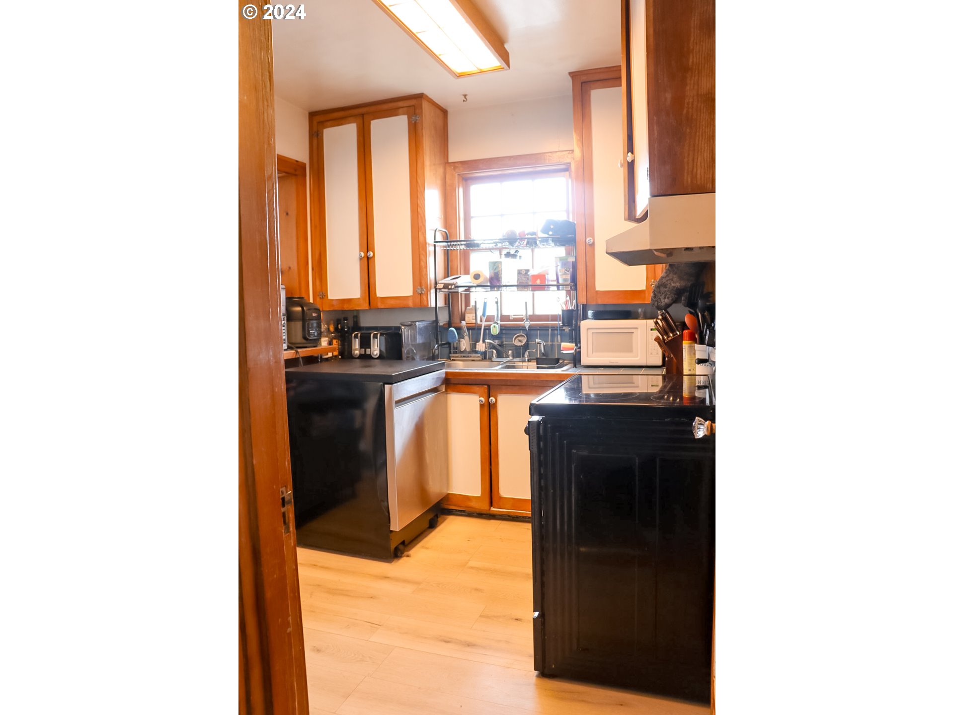 1012 Southwest Goodwin Place Pendleton, OR 97801 - Photo 8 of 17 a kitchen with a sink and cabinets