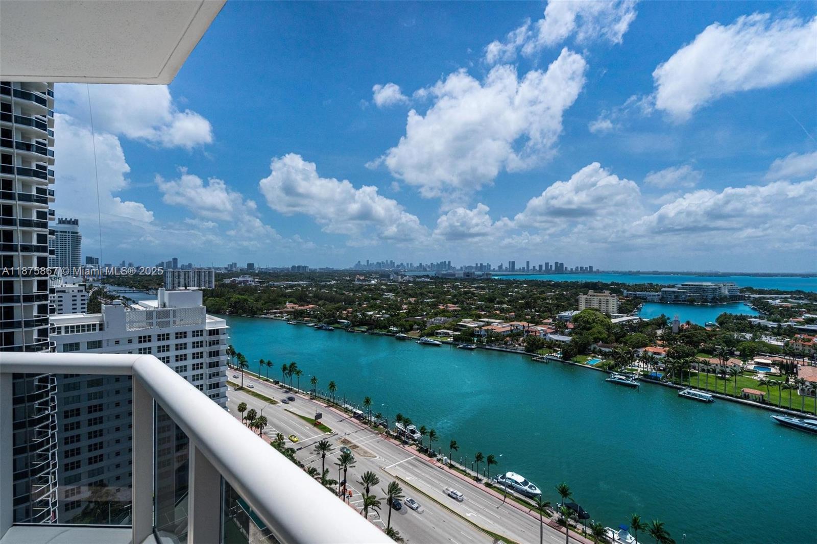 4779 Collins Avenue, Unit 2305 Miami Beach, FL 33140 - Photo 20 of 35 a view of a lake from a balcony
